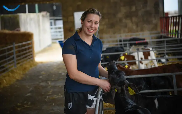 dairy farmer of the year finalist Lauren takes care of calf-rearing